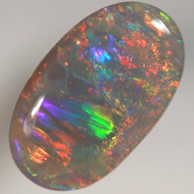 SOLID SEMI BLACK OPAL Quality opal rolling flashes of rainbow fire over sparkles. With VIDEO